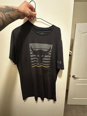 Under Armour Black Short Sleeve Performance Tee with Bull Logo and Yellow Accent